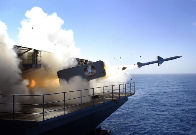 © Bloomberg. AT SEA - AUGUST 13: In this handout photo provided by the U.S. Navy, a RIM-7P NATO Sea Sparrow Missile launches the Nimitz-class aircraft carrier USS Abraham Lincoln (CVN 72) during a stream raid shoot exercise on August 13, 2007 in the Pacific Ocean, At Sea. Lincoln's self-defense systems fired four Sea Sparrow missiles, engaging and destroying two BQM-74E turbojet-powered drone aircraft and a High-Speed Maneuvering Surface Threat (HSMST) remote controlled Rigid Hulled Inflatable Boat (RHIB) during the event. Lincoln and embarked Carrier Air Wing (CVW) 2 are underway off the coast of Southern California conducting Tailored Ship's Training Availability (TSTA). (Photo by Jordon R. Beesley/U.S. Navy via Getty Images)