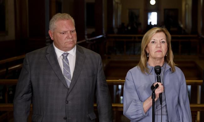 © Bloomberg. Doug Ford and Christine Elliott Photographer: Cole Burston/Bloomberg