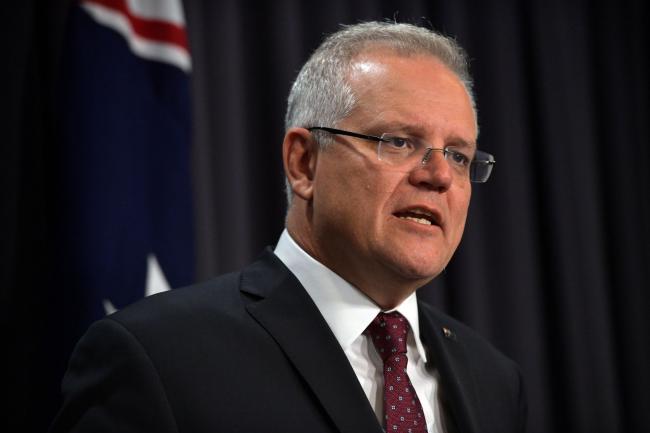 © Bloomberg. Scott Morrison, Australia's prime minister, speaks during a news conference at Parliament House, Canberra, Australia, on Thursday, Feb. 6, 2020. Morrison has shuffled key Cabinet portfolios, appointing new ministers to lead resources and agriculture after scandals and squabbles within his government’s junior coalition partner triggered two resignations.