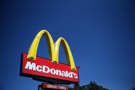 © Getty Images. A sign is posted in front of a McDonald's restaurant on March 12, 2013 in Mill Valley, California.