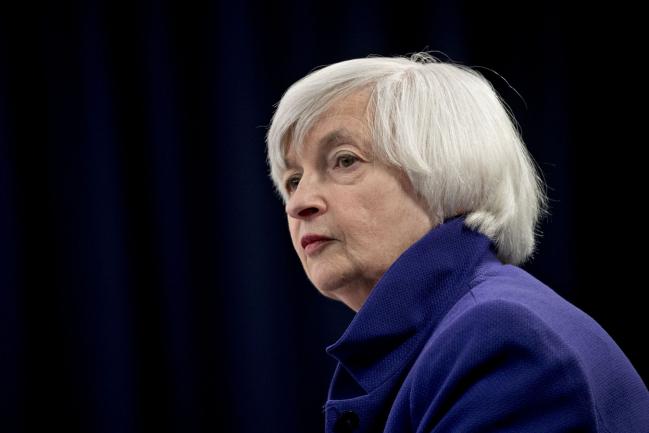 © Bloomberg. Janet Yellen, chair of the U.S. Federal Reserve, listens to a question during a news conference following a Federal Open Market Committee (FOMC) meeting in Washington, D.C., U.S., on Wednesday, Dec. 13, 2017. Federal Reserve officials followed through on an expected interest-rate increase and raised their forecast for economic growth in 2018, even as they stuck with a projection for three hikes in the coming year.