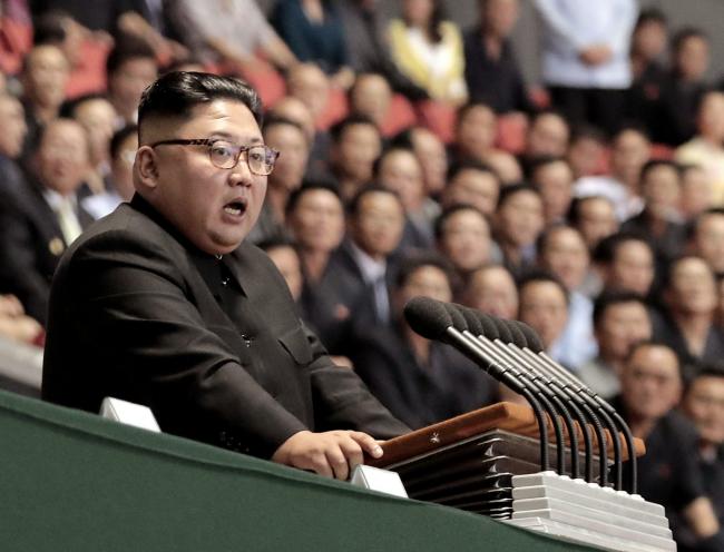 © Bloomberg. PYONGYANG, NORTH KOREA - SEPTEMBER 19: (EDITORIAL USE ONLY, NO COMMERCIAL USE) North Korean leader Kim Jong Un speaks after watch the gymnastic and artistic performance at the May Day Stadium on September 19, 2018 in Pyongyang, North Korea. Kim and Moon meet for the Inter-Korean summit talks after the 1945 division of the peninsula, where they will discuss ways to denuclearize the Korean Peninsula. (Photo by Pyeongyang Press Corps/Pool/Getty Images)