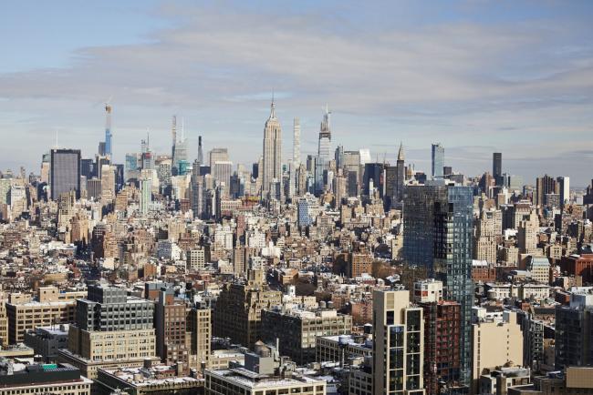 © Bloomberg. The Manhattan skyline is seen from the roof terrace at the new Citigroup Inc. headquarters in New York, U.S., on Tuesday, Dec. 3, 2019. Citigroup's trading floors - long known for being festooned with flags marking the home countries of its hundreds of traders, and banners touting years of good performance - have gotten swankier, with floor-to-ceiling windows, desks outfitted with 43-inch computer monitors and small cafeterias on every floor. Photographer: Marc McAndrews/Bloomberg