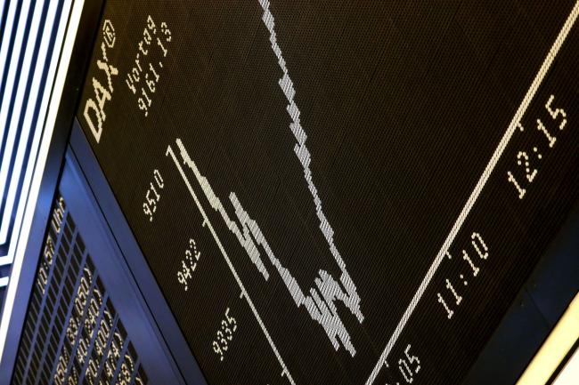 © Bloomberg. The DAX Index curve sits on display inside the Frankfurt Stock Exchange, operated by Deutsche Boerse AG, in Frankfurt, Germany, on Friday, March 13, 2020. European equities restored their initial gains as trading remained volatile in the final session of the market’s worst week since the global financial crisis. Photographer: Alex Kraus/Bloomberg