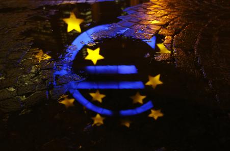 © Reuters/Kai Pfaffenbach. The euro has hit a nine-year low on investor fears about an upcoming meeting of the European Central Bank, which will likely vote in favor of an aggressive stimulus plan that could help the economy while sending the euro even further down.