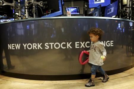 © Reuters/Brendan McDermid. Stocks R Us: A little girl plays on the floor of the New York Stock Exchange Nov. 27, 2015. Traders traditionally bring their kids to work for the half day of trading on the Friday after the Thanksgiving holiday.