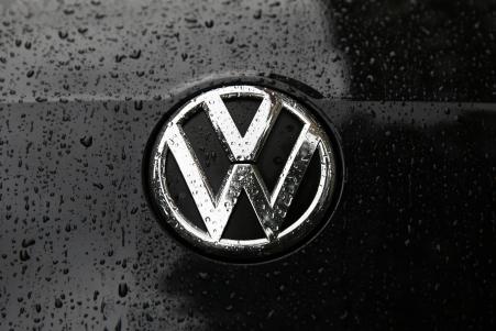 © Reuters/Stefan Wermuth. Volkswagen's CEO faced a reckoning before his board over revelations involving the ongoing emissions scandal. Pictured: Raindrops are seen on the badge of a diesel Volkswagen Passat in central London, Britain, on Sept. 22, 2015.