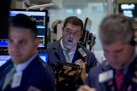 © Reuters/Brendan McDermid. Traders work on the floor of the New York Stock Exchange, Sept. 15, 2015.