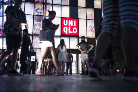 © FRED DUFOUR/Agence France-Presse/Getty Images. Uniqlo's brand is suffering losses at its American stores.