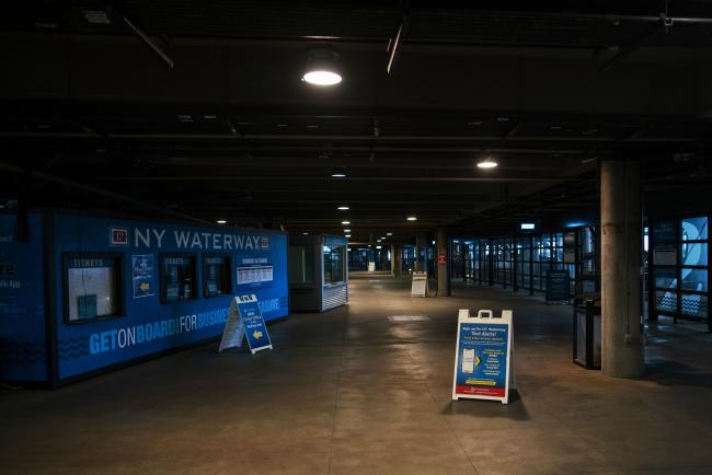 © Bloomberg. An empty ferry station to commute to New York, in Hoboken, New Jersey on March 23.