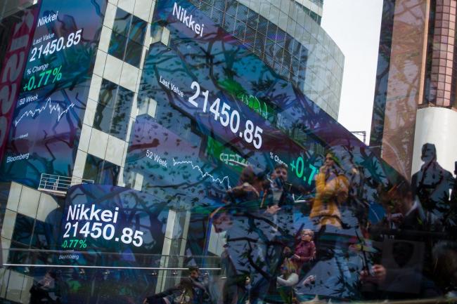 &copy Bloomberg. Monitors display Nikkei figures outside Morgan Stanley & Co. headquarters in the Times Square neighborhood of New York, U.S., on Friday, March 15, 2019. U.S. stocks joined a global advance in equities sparked by China's renewed commitment to stimulus as investors grew more confident that central banks will remain accommodative. Photographer: Michael Nagle/Bloomberg