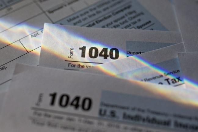 © Bloomberg. U.S. Department of the Treasury Internal Revenue Service (IRS) 1040 Individual Income Tax forms