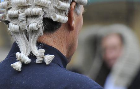 © Reuters/Toby Melville. Australian law firm Slater & Gordon's shares lost half their value over proposed changes in U.K.'s legal rights for people injured in car accidents. Pictured: Judges walk into the Houses of Parliament in central London, Oct. 1, 2010.