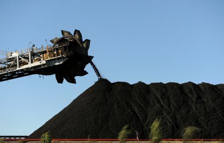 © Greg Wood/AFP/GettyImages. The -billion coal mine in Queensland is expected to produce up to 60 million tons of coal for export every year, mostly to India. This photo taken on April 25, 2012 shows coal being stockpiled at the coal port of Newcastle in Australia's New South Wales state.