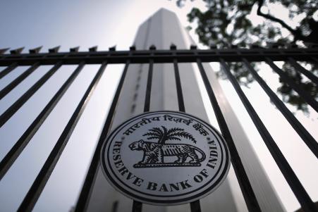 © Reuters/Danish Siddiqui. The Reserve Bank of India (RBI) seal is pictured on a gate outside the RBI headquarters in Mumbai, Oct. 29, 2013.
