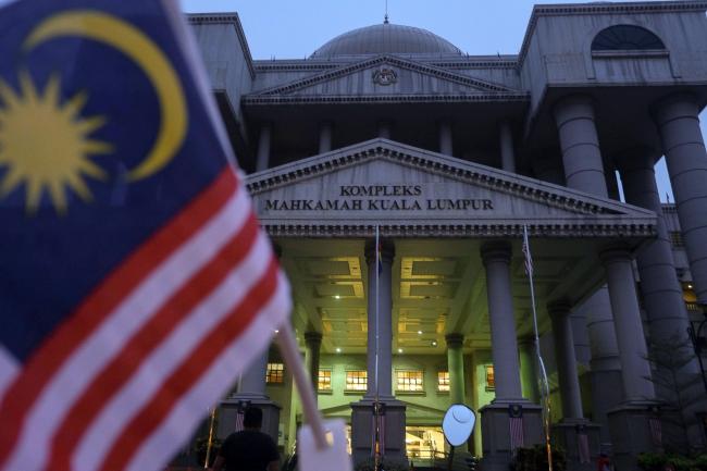 © Bloomberg. The Kuala Lumpur Courts Complex stands in Kuala Lumpur, Malaysia, on Wednesday, Aug. 28, 2019. Malaysian prosecutors will seek to prove that former Prime Minister Najib Razak acted together with fugitive financier Jho Low in their alleged roles in 1MDB, as the former premier faces his biggest trial linked to the troubled state fund. Photographer: Samsul Said/Bloomberg