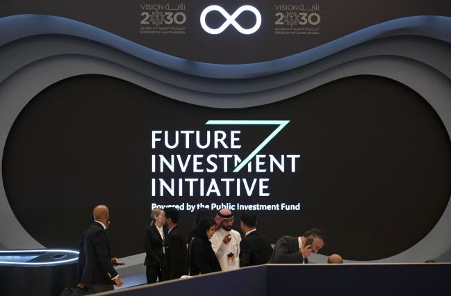 © Bloomberg. An advertisement sponsored by the Public Investment Fund (PIF) sits on display on the opening day of the Future Investment Initiative (FII) forum at the Ritz Carlton hotel in Riyadh, Saudi Arabia, on Tuesday, Oct. 29, 2019. Central banks have run out of firepower to fight the next economic downturn, according to global finance chiefs gathered at an investment forum in Saudi Arabia on Tuesday. Photographer: Faisal Al Nasser/Bloomberg