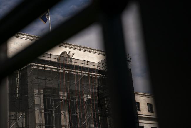 © Bloomberg. The Marriner S. Eccles Federal Reserve building stands in Washington, D.C., U.S., on Tuesday, March 17, 2020. The Trump administration is backing sending direct payments of $1,000 or more to Americans within two weeks as part of an $850 billion plan to blunt some of the economic impact of the widening coronavirus outbreak. Photographer: Andrew Harrer/Bloomberg