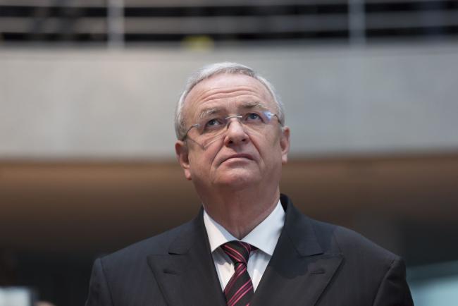 © Bloomberg. Martin Winterkorn, the former chief executive officer of Volkswagen AG, arrives to testify to a parliamentary committee in the Bundestag in Berlin, Germany, on Thursday, Jan. 19, 2017. Winterkorn apologized for breaching the trust of millions of customers while defending his tenure, saying that the carmaker was always focused on quality and that he maintained an open-door policy. Photographer: Rolf Schulten/Bloomberg