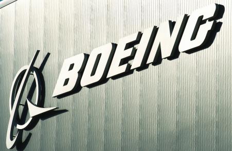 © AFP/GettyImages/Paul J. Richards. Boeing and Jet Airways signed a deal for 75 new aircraft. Pictured:The Boeing logo and name are seen on a building at Boeing's new facilities April 27, 2012, in North Charlston, South Carolina.