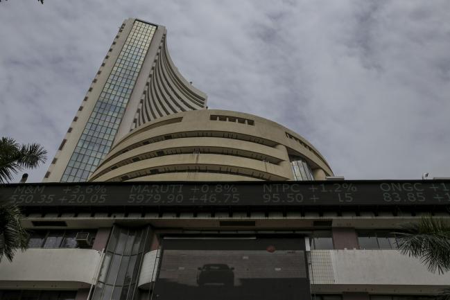 © Bloomberg. A digital ticker board is displayed at the Bombay Stock Exchange (BSE) building in Mumbai, India, on Monday, July 6, 2020. The Sensex is headed for a four-month high, even as India overtook Russia to become the country with the third-largest caseload of coronavirus infections. Only the U.S. and Brazil now have more infections than India. Photographer: Dhiraj Singh/Bloomberg