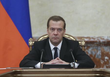 © Ekaterina Shtukina/Sputnik/Reuters. Prime Minister Dmitry Medvedev chairs a government meeting in Moscow, Nov. 26, 2015. Medvedev ordered the Russian government to draw up measures that would include freezing some joint investment projects with Turkey, in retaliation for the downing of a Russian warplane by Turkey.