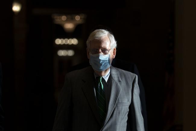 © Bloomberg. Mitch McConnell walks to the Senate Floor in Washington D.C., on Sept. 8.