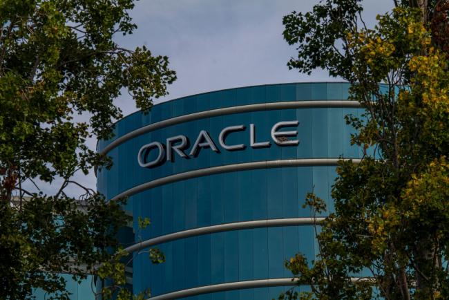 © Bloomberg. Oracle Corp. headquarters campus stands in Redwood City, California, U.S., on Tuesday, Aug. 18, 2020. Oracle Corp., the worlds second-largest software maker, is weighing a surprise bid for part of TikToks business, seeking to rival Microsoft Corp. in the race to acquire the viral video streaming app, according to people familiar with the matter. Photographer: David Paul Morris/Bloomberg