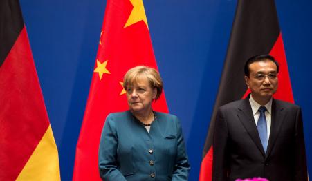 © Reuters/Johannes Eisele/Pool. German Chancellor Angela Merkel (left) and Chinese Premier Li Keqiang look on after a signing ceremony in Hefei Oct. 30, 2015.