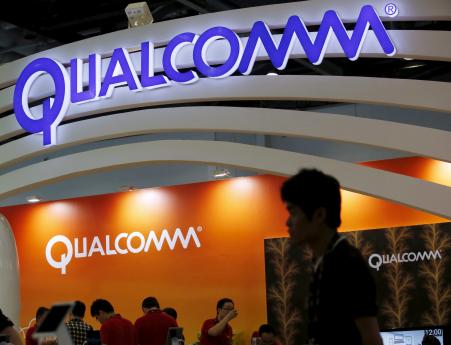 © Reuters/Kim Kyung-Hoon. Qualcomm, Inc. was hit with twin antitrust investigations by the European Commission Thursday. In this photo, dated April 28, 2015, Qualcomm's logo is seen at its booth at the Global Mobile Internet Conference in Beijing, China.