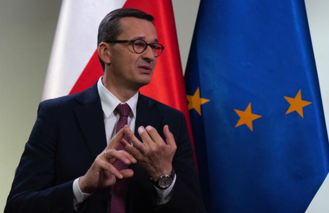 © Bloomberg. Mateusz Morawiecki, Poland's prime minister, gestures while speaking during an interview in Warsaw, Poland, on Monday, Sept. 7, 2020. Poland's zloty has room to strengthen as the economy recovers from the coronavirus crisis faster than previously expected, Morawiecki said. Photographer: Piotr Malecki/Bloomberg