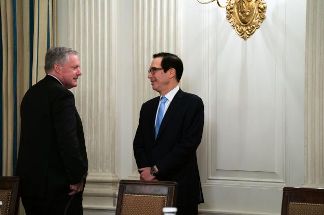 © Bloomberg. Steven Mnuchin, right, and Mark Meadows. Photographer:Pool/The New York Times//Bloomberg