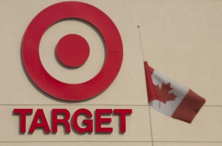 © Reuters/Peter Power. A Canadian flag flies outside a Target store in Canada, on Jan. 15, 2015. Target Corp will abandon its expansion in the country less than two years after launch. By mid-April, all 133 stores in the Target Canada operation will be closed.