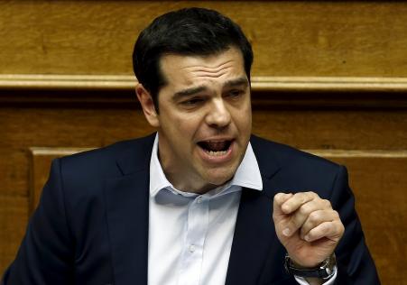 © Reuters/Alkis Konstantinidis. A day after Greece became the first European Union country to default on an International Monetary Fund (IMF) loan, the Greek government told its creditors that it is willing to accept many of the terms of a bailout package that it had earlier rejected. Pictured: Greek Prime Minister Alexis Tsipras delivers a speech during a parliamentary session in Athens, Greece June 28, 2015.