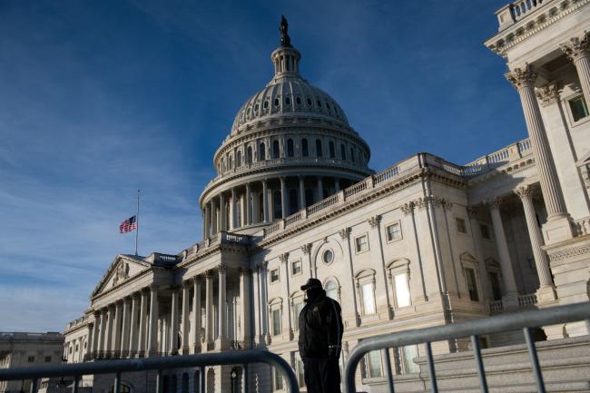 © Bloomberg. A U.S. Capitol Police officer stands guard outside the U.S. Capitol in Washington, D.C., U.S., on Saturday, Jan. 9, 2021. House Democrats are prepared to impeach President Donald Trump if he doesn't immediately resign, House Speaker Nancy Pelosi said, as the president came under increasing pressure from members of both parties for encouraging a mob that stormed the U.S. Capitol. Photographer: Graeme Sloan/Bloomberg