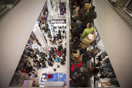 © Reuters/Andrew Kelly. Shoppers enter Macy's to kick off Black Friday sales in New York on Nov. 27, 2014. Retail analysts say 'Super Saturday' on Dec. 20 could oust Black Friday as the biggest retail-generating day of 2014. Department stores are banking on the shopping day to make up for sluggish sales during the rest of the year.