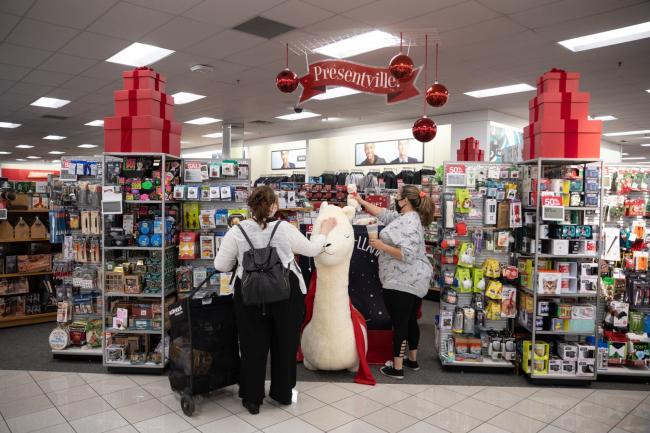 © Bloomberg. Shoppers view toys for sale at a Kohl's Corp. department store in Woodstock, Georgia, U.S., on Monday, Nov. 23, 2020. For the first time ever on Black Friday, more consumers intend to shop online than in stores, a switch driven by the coronavirus pandemic,, according to a survey by Deloitte. Photographer: Dustin Chambers/Bloomberg