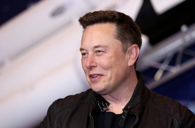 © Bloomberg. Elon Musk, founder of SpaceX and chief executive officer of Tesla Inc., arrives at the Axel Springer Award ceremony in Berlin, Germany, on Tuesday, Dec. 1, 2020. Tesla Inc. will be added to the S&P 500 Index in one shot on Dec. 21, a move that will ripple through the entire market as money managers adjust their portfolios to make room for shares of the $538 billion company.