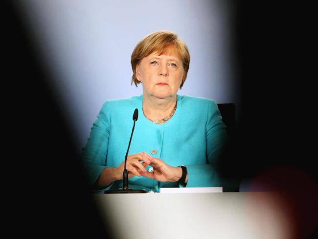 © Bloomberg. BERLIN, GERMANY - JUNE 03: German Chancellor Angela Merkel speaks to the media following negotiations between the three parties, who make up the current German coalition government, over a federal aid package during the coronavirus crisis on June 3, 2020 in Berlin, Germany. The package, worth up to EUR 100 million, is meant to shore up the German economy while also providing social relief following the severe consequences of the pandemic. (Photo by Mika Schmidt-Pool/Getty Images)