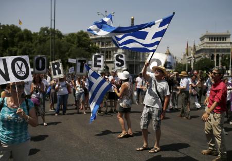 © Reuters/Javier Barbancho. Three opinion polls, GPO, Metron Analysis and MRB, suggest 'No' vote likely to prevail, meaning Greeks have rejected the austerity demands of international creditors.