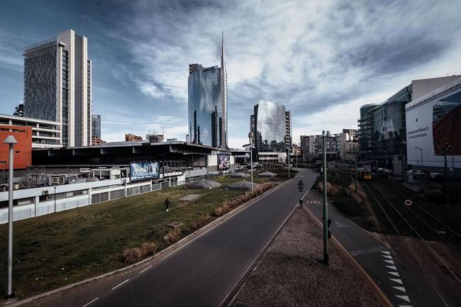 © Bloomberg. The headquarters of Unicredit SpA, second left, stands in Milan, Italy, on Wednesday, Feb. 26, 2020. As the number of people infected by the coronavirus in Italy rises above 300 -- mostly in the rich, industrial north -- restrictions imposed to stem its spread are threatening deeper economic woes. Photographer: Gianmarco Maraviglia/Bloomberg