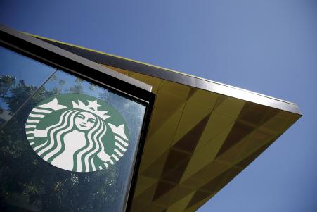 © Reuters/Lucy Nicholson. Starbucks' quarterly earnings exceeded analysts' forecasts.