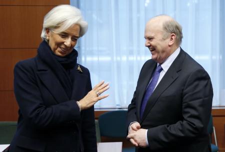 © Reuters/Francois Lenoir. International Monetary Fund (IMF) Managing Director Christine Lagarde talks to Ireland's Finance Minister Michael Noonan (R) during an euro zone finance ministers meeting at the European Union Council in Brussels February 11, 2013.