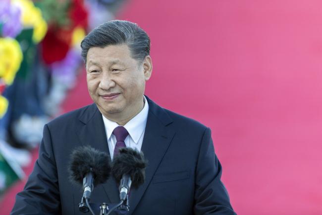 © Bloomberg. Xi Jinping, China's president, delivers a speech after arriving at Macau International Airport in Macau, China, on Wednesday, Dec. 18, 2019. President Xi is expected to use a visit marking 20 years of Chinese rule over Macau this week to send a message to the protest-stricken financial hub some 50 kilometers (30 miles) to the east: work with us and get rich.