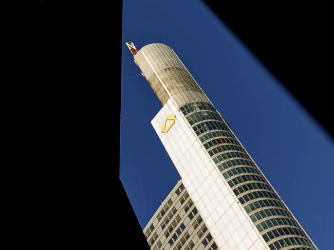 © Bloomberg. The Commerzbank AG logo sits on the bank's headquarters in Frankfurt, Germany, on Sunday, Aug. 5, 2018. Germany’s second biggest bank reports half year earnings on Aug. 7. Photographer: Alex Kraus/Bloomberg