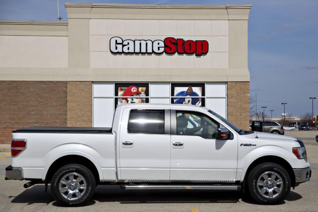 © Bloomberg. A truck sits parked outside a GameStop Corp. store in Oswego, Illinois, U.S., on Monday, April 1, 2019. GameStop is scheduled to release earnings figures on April 2.