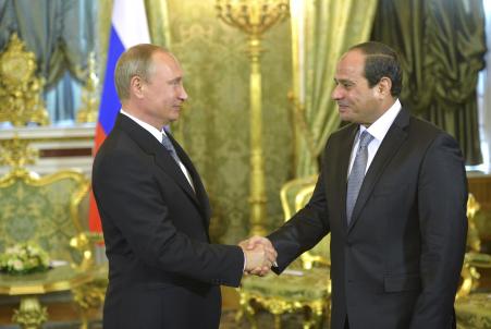 © Reuters/Alexei Druzhinin/RIA Novosti/Kremlin. Egypt may use the Russian ruble in its tourism sector, Egypt's president said during a visit to Moscow. Above, Russian President Vladimir Putin, left, shakes hands with his Egyptian counterpart Abdel Fattah al-Sisi during their meeting in Moscow, Aug. 26, 2015.