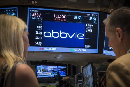© Reuters/Brendan McDermid. A screen displays the share price for pharmaceutical maker AbbVie on the floor of the New York Stock Exchange July 18, 2014.