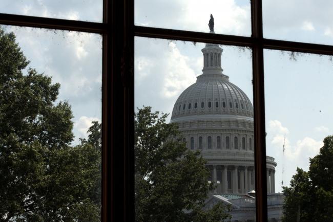 © Bloomberg. The U.S. Capitol is seen from the Russell Senate Office Building in Washington, D.C., U.S., on Tuesday, Aug. 11, 2020. President Donald Trump's weekend set of executive actions aimed at shoring up the U.S. economy while stimulus talks remain stalled in Congress seems to have done little to add urgency to the negotiations. Photographer: Stefani Reynolds/Bloomberg