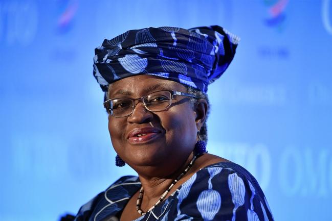 © Bloomberg. Nigerian former Foreign and Finance Minister Ngozi Okonjo-Iweala smiles during a press conference on July 15, 2020, in Geneva, following her hearing before World Trade Organization 164 member states' representatives, as part of the application process to head the WTO as Director General.  Photographer: Fabrice Coffrini/AFP via Getty Images